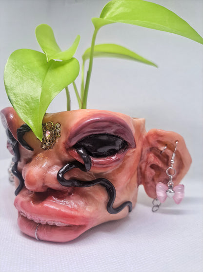 Creepy handmade face flowerpot
